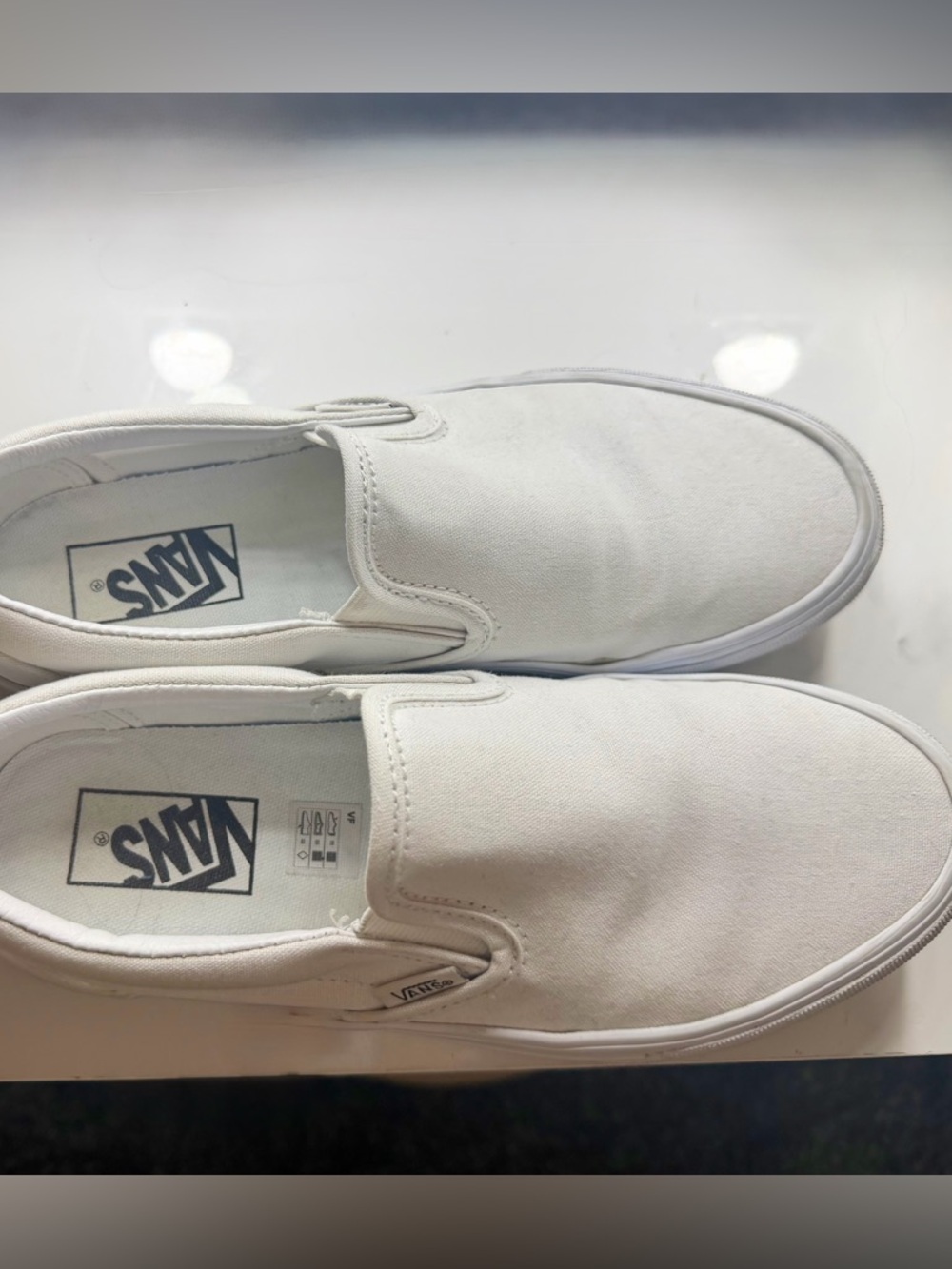 Vans Slip-On Canvas Sneakers in White